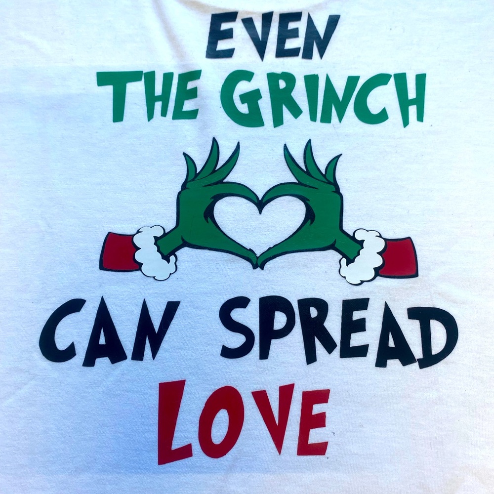"Even the Grinch Can Spread Love Graphic Tee